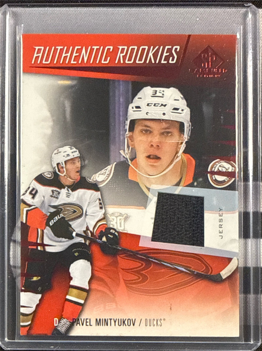 23-24 SP Game Used Pavel Mintyukov Authentic Rookies Red Jersey #274 Front