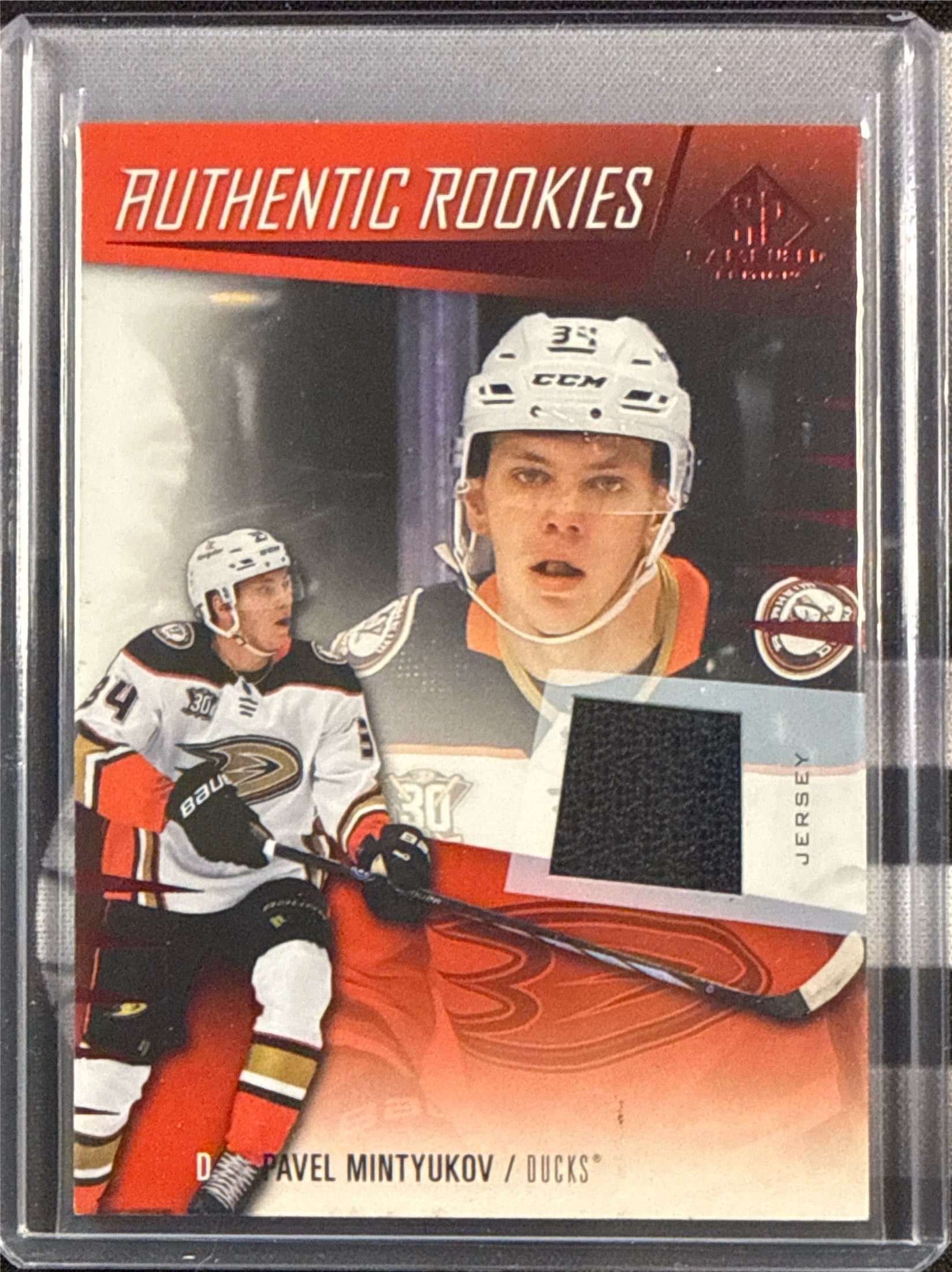 23-24 SP Game Used Pavel Mintyukov Authentic Rookies Red Jersey #274 Front