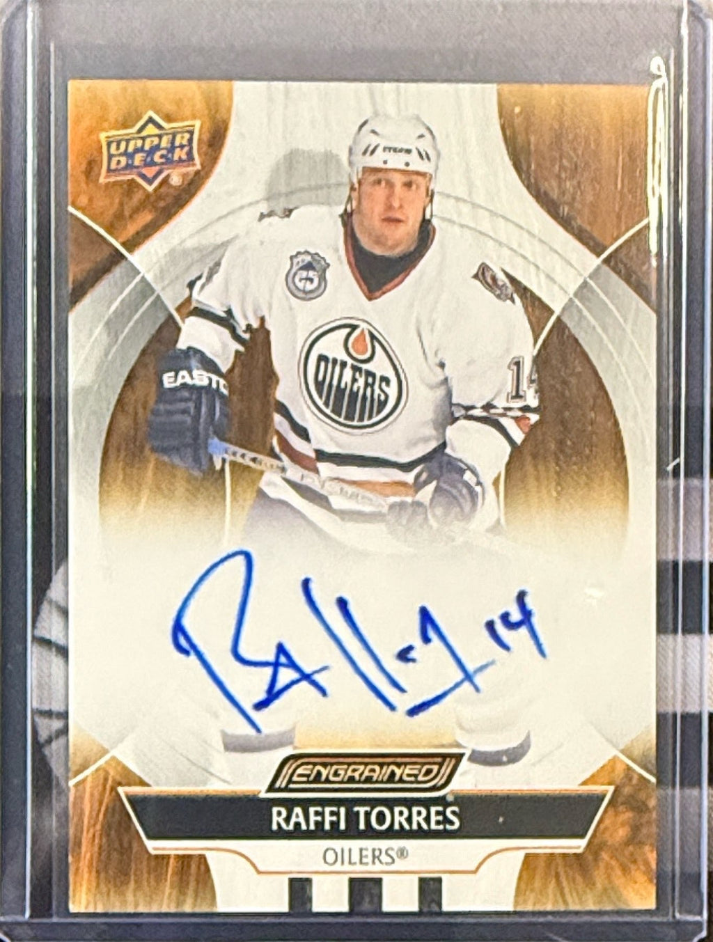 Front of 2024-25 Upper Deck Engrained Raffi Torres autograph CA-FT